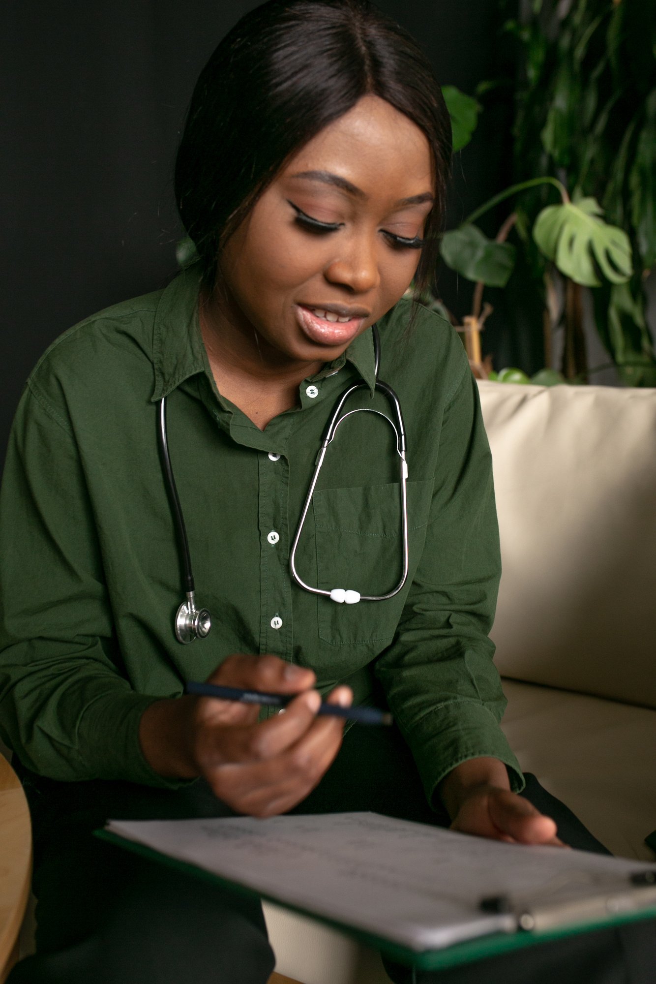 Green Medicine Doctor with a Clipboard